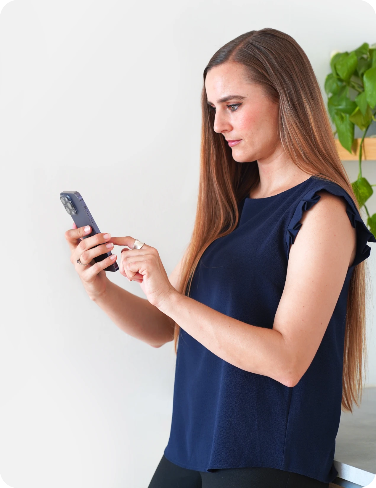 Woman reading a form on a phone